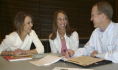 Whitney Call and her parents, Bryan and Janna Call, at Utah State University's Scholars Day 2005