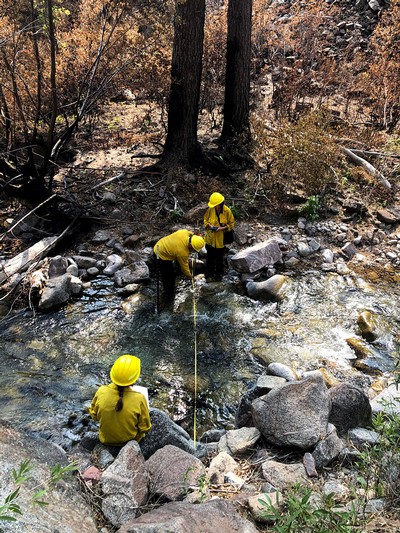 Installing stream gages in September 2020 following the wildfire.