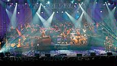 The band Kansas performing with a symphony orchestra