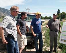 USU professor Ralph Whitesides with biodiesel industry officials