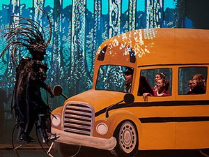The school bus and children from the USU Opera Theatre production of “Help, Help the Globolinks!”