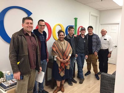 Dallin Graham and three 4-H STEM ambassadors pose with representatives from Google Fiber