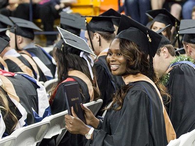 student in graduation cap and gown