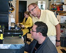 USU's Randy Lewis and students in lab