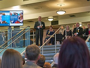 USU President Stan Albrecht speaking at the naming ceremony for the Hansen Atrium