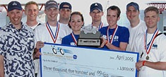 Utah State University's Moonbuggy team with its first place award check.