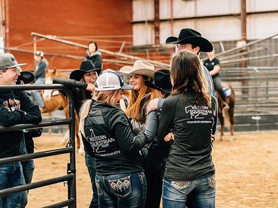 Members of USU’s Western Equestrian Team taking a break