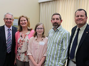 Professor Kelly Kopp with family and USU administrators at her Inaugural Professor Lecture event