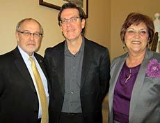 Provost Raymond Coward, professor Greg Madden, First Lady Joyce Albrecht