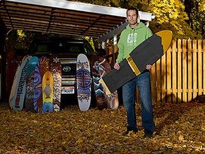 Jeremy Jensent with a sampling of his powdersurfing boards