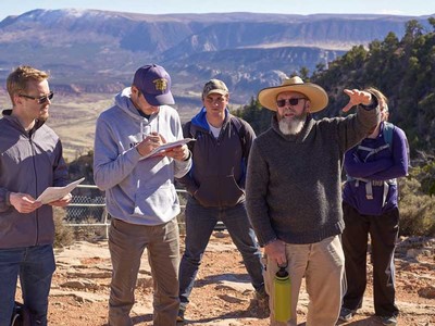 Archaeologist Judson Finley speaks with students at Dinosaur National Monument