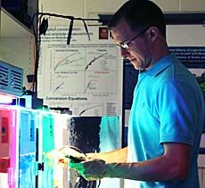 USU student Kevin Cope in a laboratory