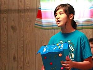 Angie from the Middle School team plays the role of Pandora