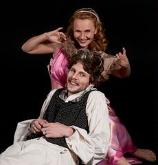 Wendy Hassan plays Titania, Queen of the Fairies; Lance Rasmussen plays Bottom