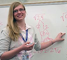 USU undergradutae Morgan Summers at whiteboard