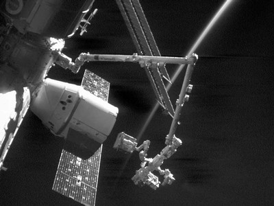 SDL built dewar is shown here being removed from the SpaceX Dragon trunk