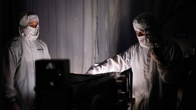 Engineers prepare the engineering test unit of the Short-Wave Infrared Detection Assembly.