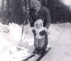 Paul as a child skiing with his father