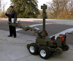 Steve Milne with the Bomb Squad robot