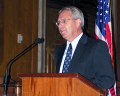 Utah State University President Stan Albrecht speaking in Washington, D.C.