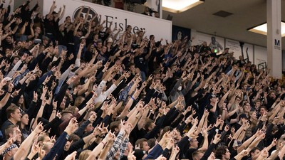 A crowd at a basketball game.