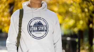 Person wearing a USU sweatshirt.