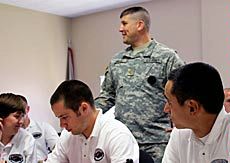 Maj. Matthew Badell in classroom with cadets
