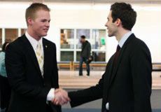 new ASUSU president Erik Mikkelsen with outgoing president Tyler Tolson