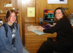 Advisor Carol Sainsbury meets with a student