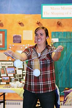 USU PSU member Laura Walker giving Poi Ball demonstration