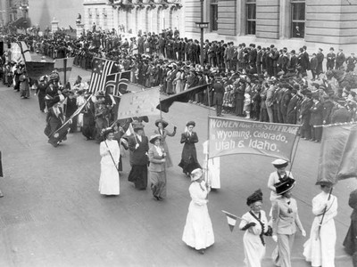women marching in voting rights parade in New York City in 1920.