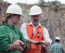 USU geology professor Jim Evans doing field work with a student