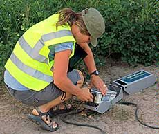 USU student with vehicle counter in Grand Teton National Park
