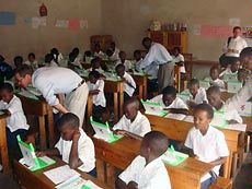students in classroom in Africa with laptops