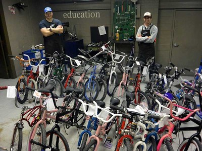 Workers at Aggie Blue Bikes