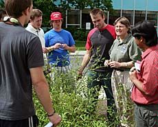 USU herberium director Mary Barkworth with a class