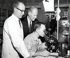 Dr. John Simmons and Dr. Eldon Gardner with a student 