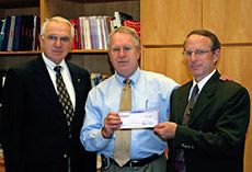 Zions Bank Presents Check to Support Families of Accident Victims