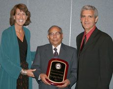 Basudeb Biswas receiving his award
