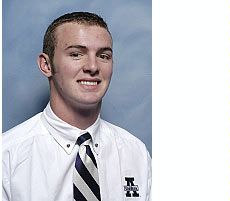 Josh Nilson, USU student assitant, gymnatics