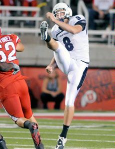 Aggie Peter Caldwell in football action