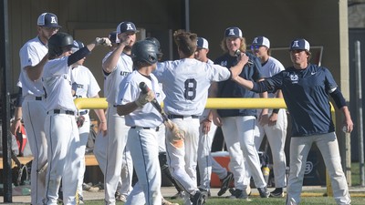 USU baseball team gathers together.