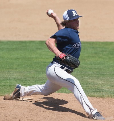 USU baseball team member throws a pitch.
