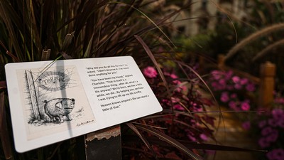 A descriptive plaque in the Charlotte's web garden.