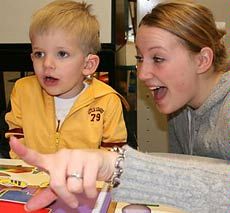 USU student working with a child