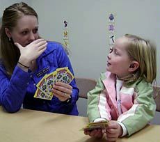USU student working with a student