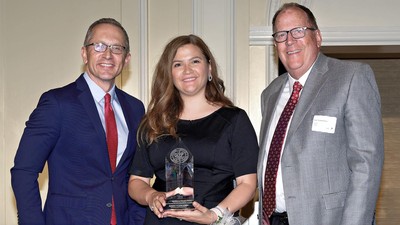USU Professor Nadia Kouraytem (middle) holding award for her work in the advanced manufacturing.