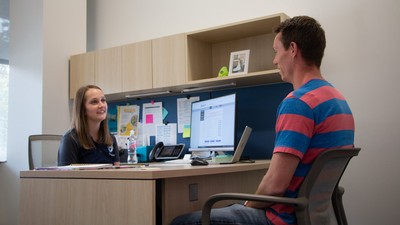 Registered dietitian Brooke Lister with a client.