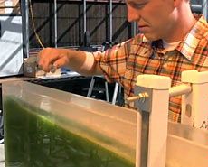 USU graduate Curtis Adams in a lab