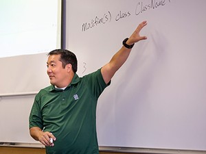 USU's Chad Mano in a classroom